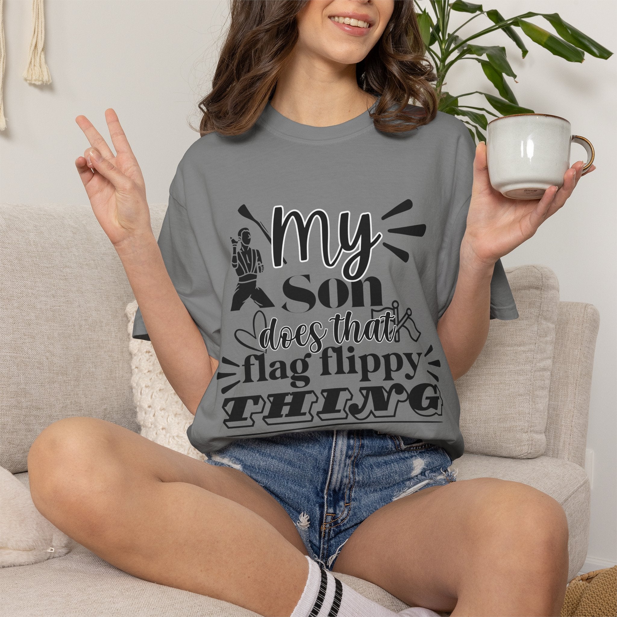 My son does that flippy flag thing- Funny Color guard T-shirt