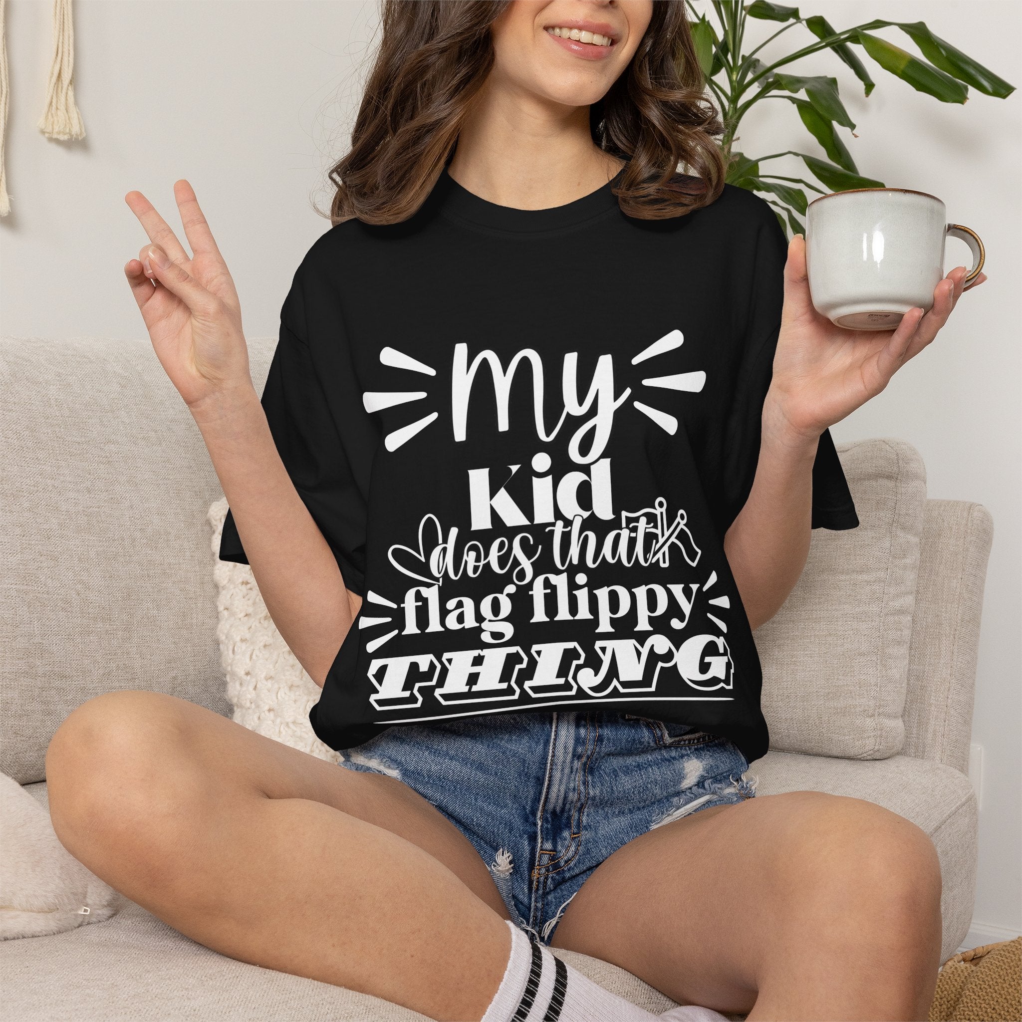 My kid does that flag flippy thing- Funny Color guard T-shirt